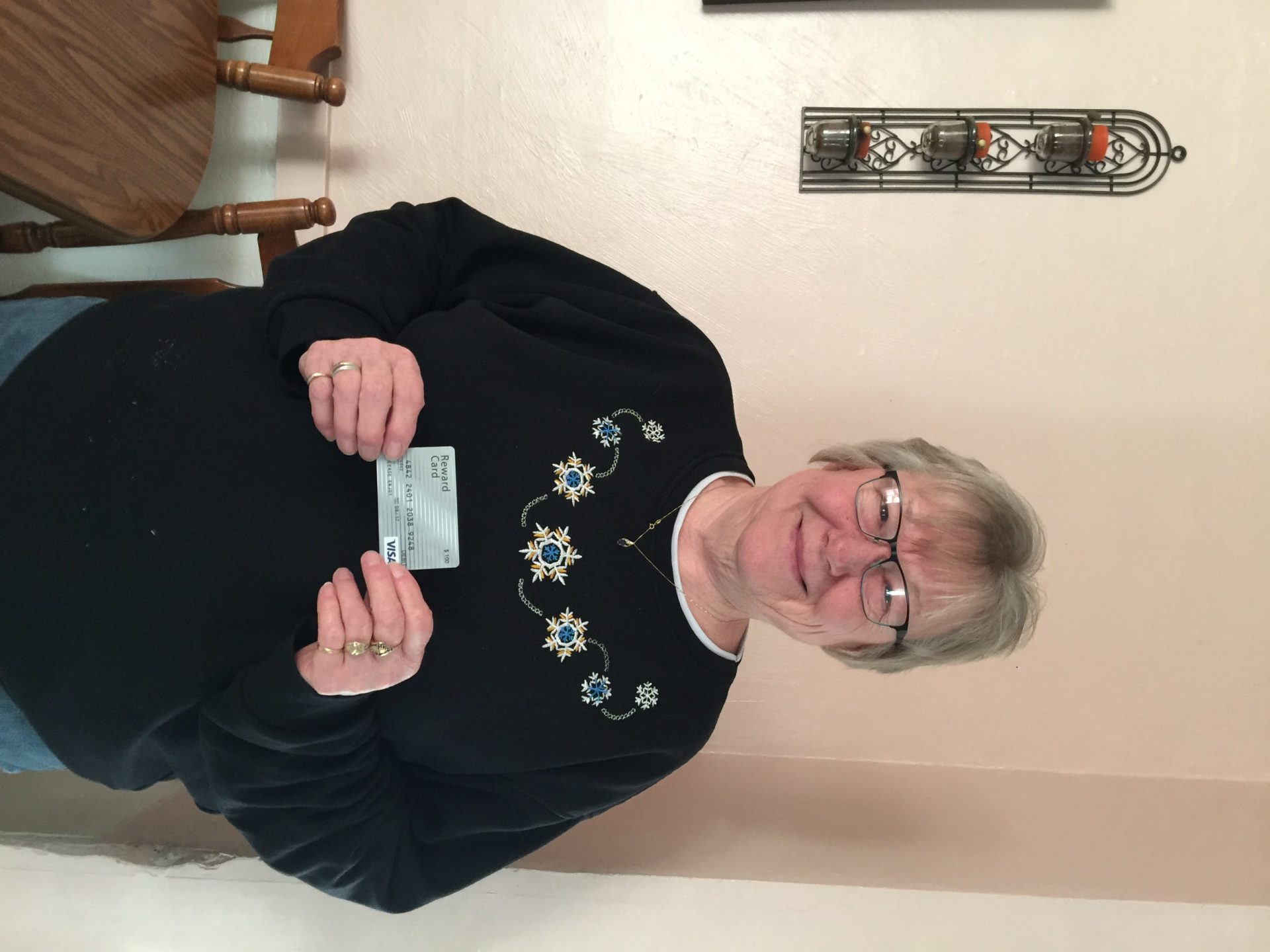 Joyce Bottorf of Petersburg, NE receives her $100 Visa gift card for completing the Great Plains Communications Q3 Customer Survey.