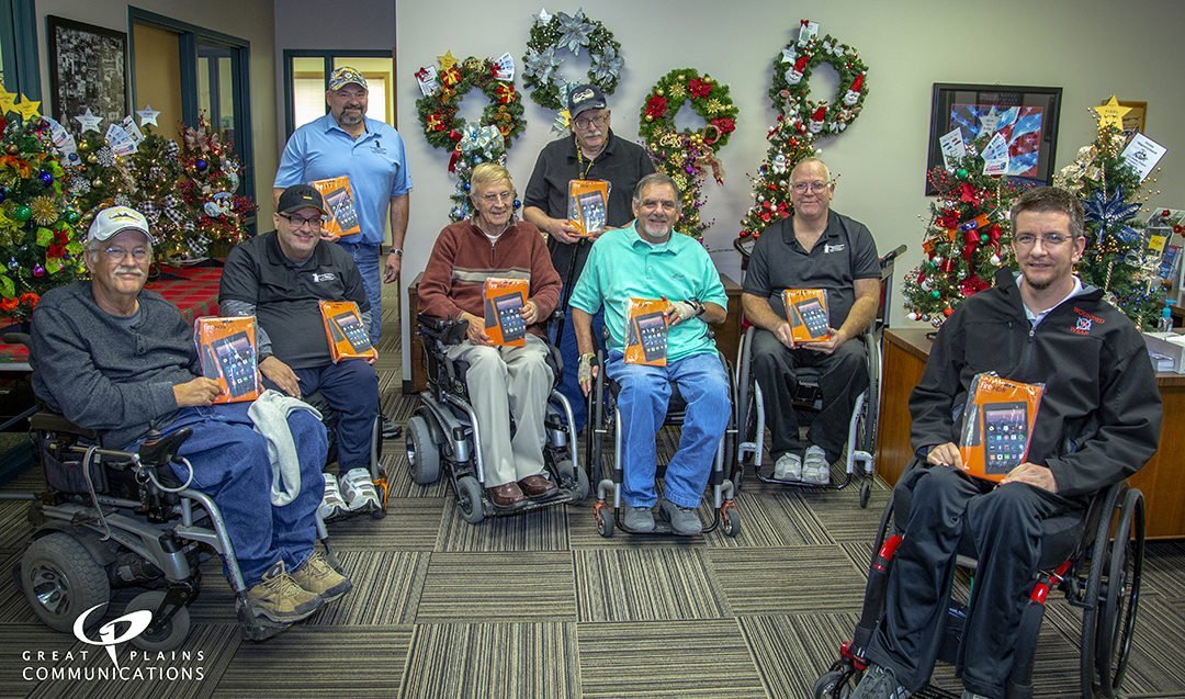 veterans in wheelchairs with tablets